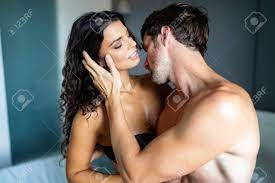Young Couple Being Intimate In Bedroom. Sensual Lovers Making Love In  Bedroom. Stock Photo, Picture and Royalty Free Image. Image 138002278.
