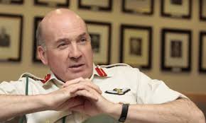 Ukraine pulls forces out of Crimea as Russia takes over military bases