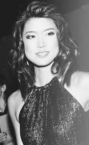 Dad gave her an old photo of her mother, dog-eared and creased. Someone had  scribbled behind it, in faded black ink: "Catherine Ahn, 2256". It wasn't  Dad's handwriting, so she'd always assumed it was Mom's.