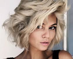 Perhaps the surprise of seeing a presumed masculine short cut instead of the girlie long cut is jarring, or viewing feminine bouncy waves incorporated to the short is intriguing, are. 50 Layered Hairstyles With Bangs