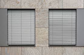 two windows with shutters outdoor blinds shutters window shutters