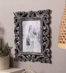 Wooden wall hanging photo frames. Buy Silver Wooden Handcrafted Vertical Wall Hanging Photo Frame By Yatha Online Decorative Single Photo Frames Photo Frames Home Decor Pepperfry Product