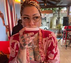 American Pickers' Danielle Colby flaunts major cleavage in low-cut shirt