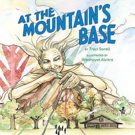 At The Mountain's Base book cover showing a grandma weaving threads surrounded by and entwined in nature