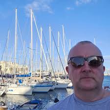A wet Sunday in Sheffield 88 years ago. Arthur Wilson, Peck and Co., Ltd.,  pianoforte, organ and musical instrument dealers, Beethoven House (left),  Johnson and Appleyards Ltd, cabinet makers, and Sheffield Creameries