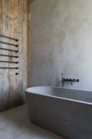 de betonlook op je muur betonlook muur verven volg ons stappenplan voor succes diy pinterest muur succes en concrete bathtub concrete bathroom modern bathtub