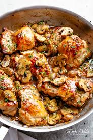 Golden Seared Chicken Thighs In A Delicious Buttery Garlic Mushroom Sauce With A Sprin In 2020 Boneless Chicken Thigh Recipes Garlic Mushrooms Chicken Thights Recipes
