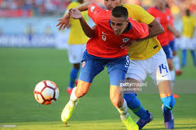 With her signature pink exterior and iconic tower, the elegant pink lady remains a renowned landmark on la jolla's distinctive prospect street commanding the. Brazil S Walce Da Silva Vies For The Ball With Chile S Diego Valencia News Photo Getty Images