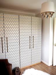 Closet door off track : Beautify Old Furniture With Wallpaper Wardrobe Makeover With Wallpaper