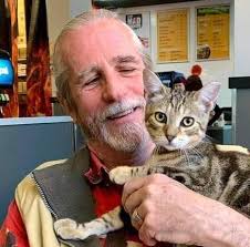 Introduction of a new cat named Lucas to the group