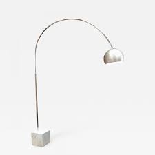 Along with the sturdy base, this floor lamp has a hanging shade that makes it well suited for a spot behind your couch for a boost of illumination. Mid Century Chrome Arc Floor Lamp With Carrara Marble Base Italy 1960s
