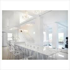 Marble Dining Table With Clear Plastic Chairs Picture Library Specialising In Interiors Lifestyle Dining Table Marble Dining Table Chairs White Dining Table