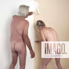 NUDE mature couple painting a