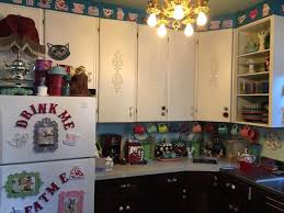 I Painted The Wallpaper In My Alice In Wonderland Kitchen Making A Checkerboard And Using Wonderland Themed Decor Alice In Wonderland Alice In Wonderland Theme