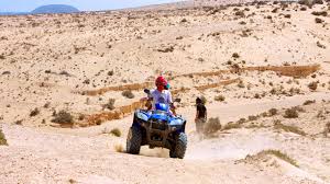 The excitement builds when our convoy of troop carriers transfer you to the staging area for our quad bike adventures. Quad Adventure Buggy Safari Bahiazul Villas Club Fuerteventura