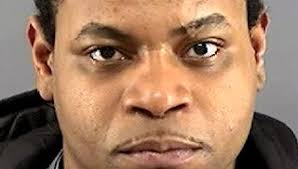 Suspect in killing of Manual coach's son turns himself in to police