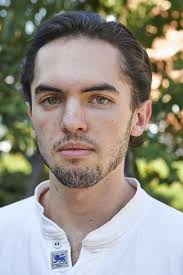 Teen thrown onto subway tracks by homeless man escapes with minor injuries 