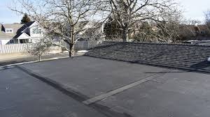 The cost of flat roof repair vs. Top Rubber Roofing Company Cape Cod Ma Corey Corey