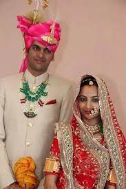 Traditionally Dressed Rajput Couple The Guy Is Wearing A Kantha Or Traditional Rajputi Necklace And The Br Rajasthani Bride Indian Bridal Big Indian Wedding