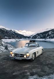 From Stuttgart To St Moritz With A Ski Laden Mercedes 300sl Roadster Classic Driver Magazine Mercedes 300sl Mercedes Roadsters