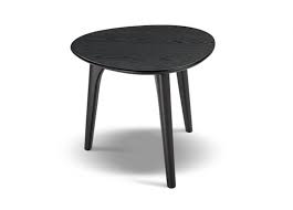 The collection is available in a variety of shapes and sizes, as well as a number of luxurious finishes such as timber, italian marble, glass and american walnut. Crescent Table By King Living Est Living Design Directory