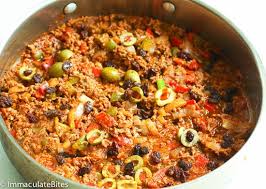 Puerto Rican Picadillo Recipe Fragrant Flavorful Ground Beef Stew With Potatoes Tomatoes Olives And Raisins Picadillo Recipe Beef Olives Recipe Picadillo