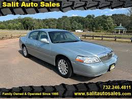 Image result for Light Ice Blue 2007 Town Car