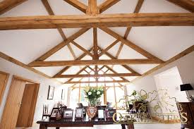 A Sieries Of Oak Trusses In A Long Dining Room In A Beautifully Designed Modern Oak Extension Timber Frame Building Exposed Trusses Roof Truss Design