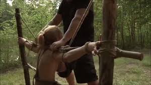 Babes tied up and fucked real hard in the forest - BDSM.one