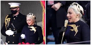 As he became more and more popular, his outfits and performances got. Lady Gaga S Gold Pin Adorned Her Dress At Joe Biden S Inauguration