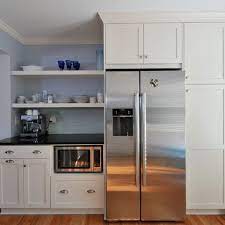 This cabinet features oak door construction with raised panel door design for a stylish decorative touch. Make The Refrigerator Look Built In With Cabinet Surround Microwave In Kitchen Shaker Kitchen Cabinets Kitchen Design