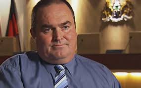 Chris Holstein stands again