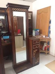 Featuring a distinctive deconstructed frame structure this beautiful getting ready table also incorporates the rich textures of exquisite wood panelling to create a tactile and truly timeless look. View 19 Wooden Dressing Table Latest Design 2020