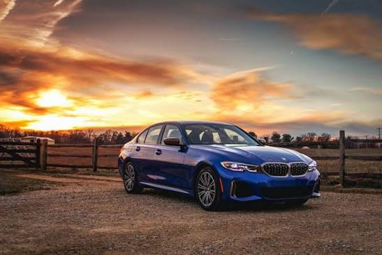 Luxury car at sunset