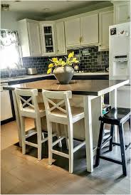 The island also conceals a mini refrigerator. Inspiring Movable Kitchen Island Pinterest On This Favorite Site Kitchen Island With Seating Ikea Portable Kitchen Island Ikea Kitchen Island