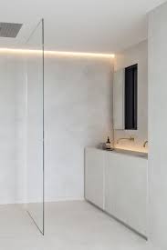 Large, neutral tiles on the walls are contrasted with the small tiles used for the flooring. 70 Stylish Minimalist Bathroom Decor Ideas Digsdigs