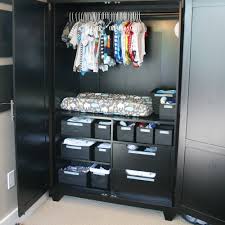 Shop target for armoires & wardrobes you will love at great low prices. Armoire Baby Central A Changing Station And Organized Baby Clothes Blue I Style