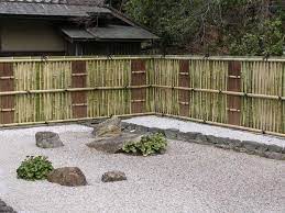 The major bulk of the invasion was fronted by the exuberantly expanding forsythia. Yet Another Zen Garden Of Nanzenji But This Time With A Cool Bamboo Fence Photo