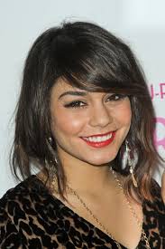 Celebrity haircut kim kardashian's full bangs. Seven Celebrity Approved Hairstyles With Side Swept Bangs Teen Vogue