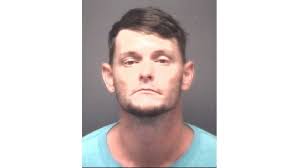 Inmate accused of injuring detention officer charged with two felonies