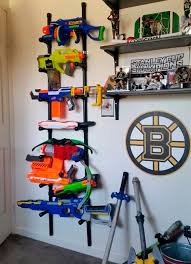 Here is a real simple diy nerf gun storage rack system for under $$20.00 bucks. Ready Aim Tidy 8 Ways To Store Nerf Guns Mum S Grapevine