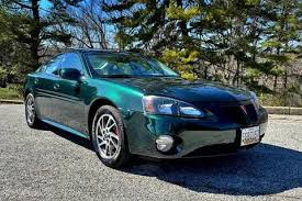 Image result for Dark Meander Green 2004 Pontiac