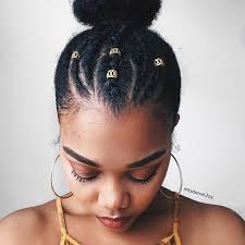 Opt for an updo that makes use of cornrows, as seen here on danielle truitt, or box braids. 10 Quick And Easy Transitioning Hairstyles Naturallycurly Com