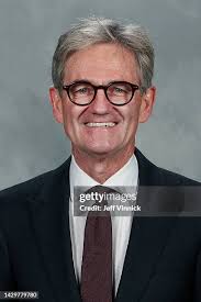 Vancouver Canucks head physician Dr. Bill Regan poses for his... News Photo 