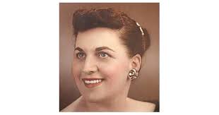 Olga DINELLI Obituary (2015)