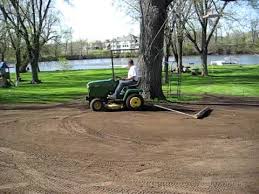 Fine grading a new construction lawn pay extra attention to grading your new construction home. John Deere Garden Tractor Used For Final Yard Grading Youtube