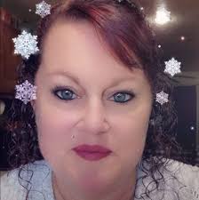 Who can create a colored tattoo with flowers in Albany, Oregon?