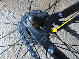 Rear dropout with adjustments screws of a single speed bicycle - Bicycles  Stack Exchange