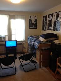 Residence Hall At Miami University I Know Its A Guy Room But I Want My Bed Lofted Like This Small Apartment Bedrooms College Bedroom Dorm Room Essentials