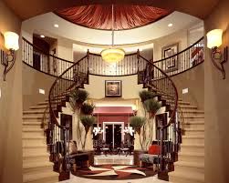 Add atmospheric lighting to your floating staircase idea 40 Fantastic Foyer Entryways With Staircases In Luxury Homes Images